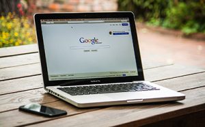 Open laptop showing search engine page leading to importance of Ocean County SEO